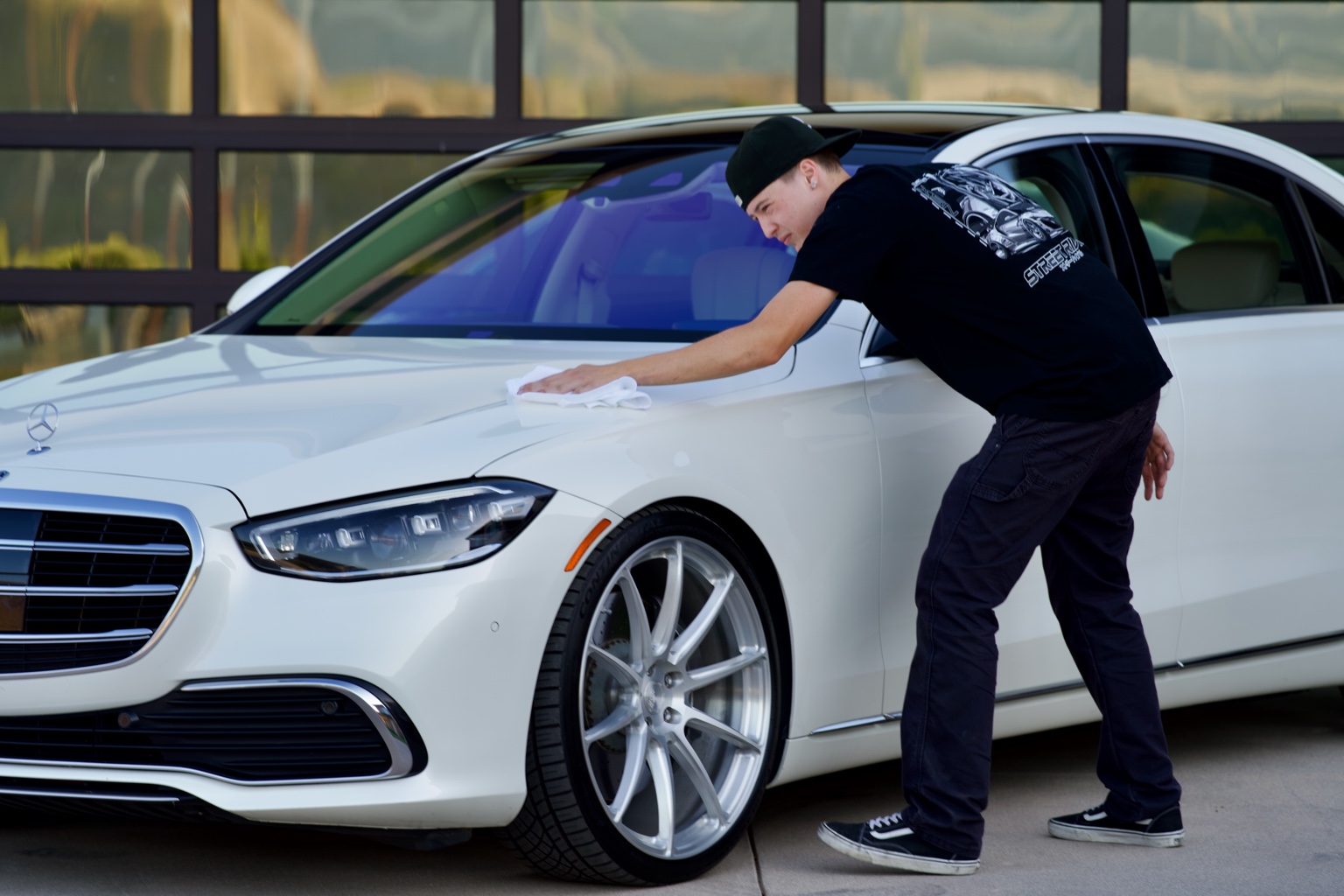 Lincoln detailing a vehicle